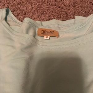 Baby blue PIKO top size small. Hardly worn